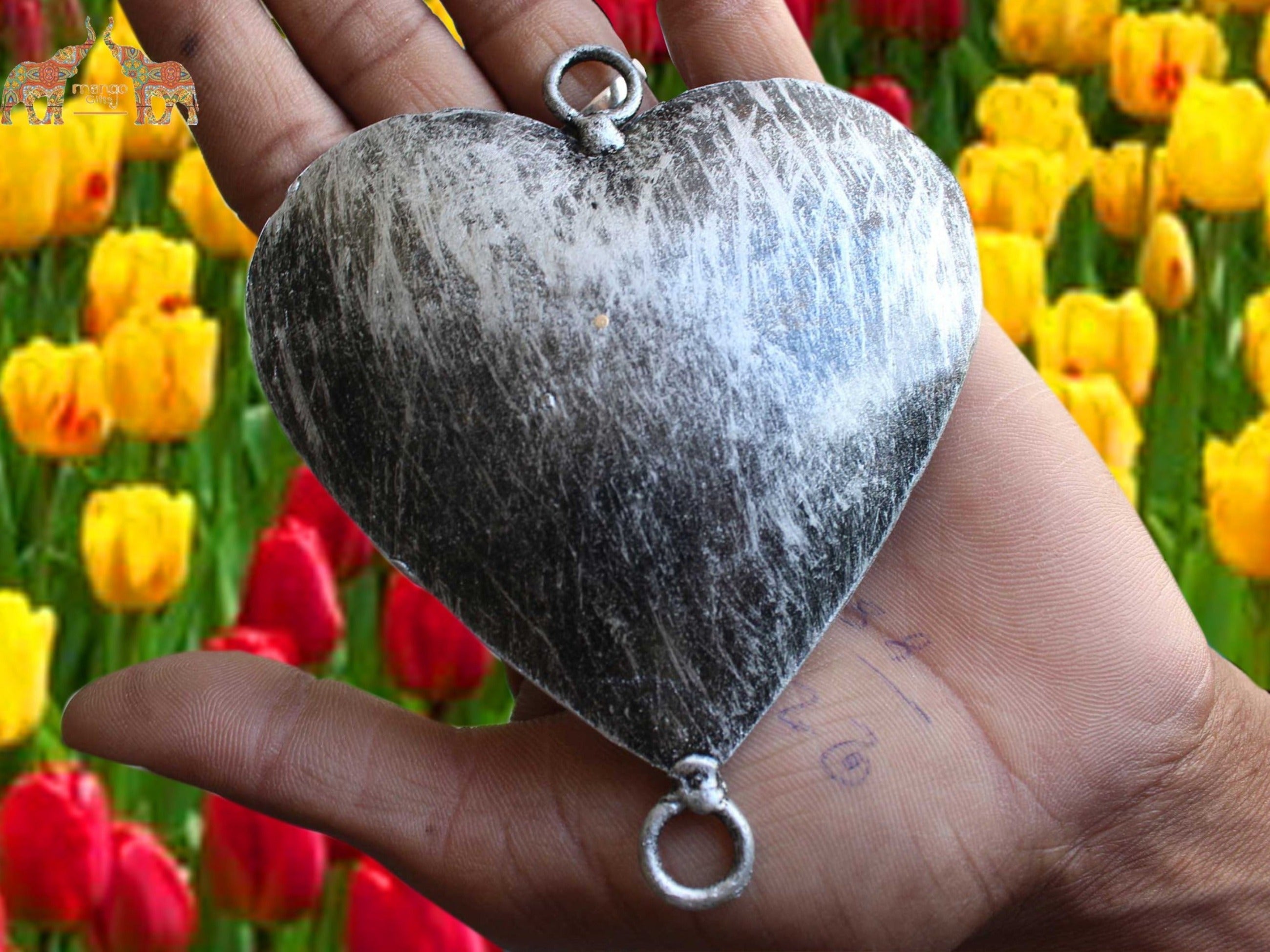Handmade gold and silver hearts, perfect for crafts. 200 pieces wholesale with antique finish. Ideal for chimes, garlands, and decorations.